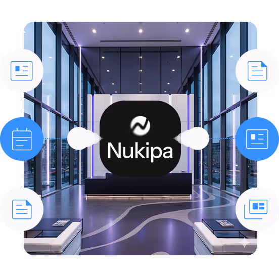 Modern office lobby with floor-to-ceiling windows, two white benches, and a central black display showing the Nukipa logo.