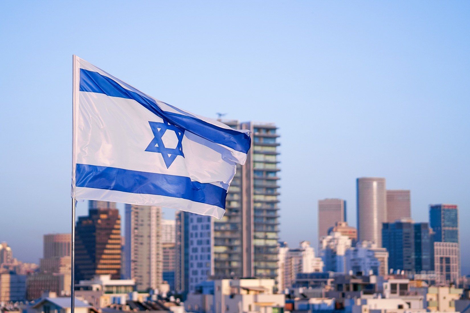 Israel flag and Tel Aviv skyline