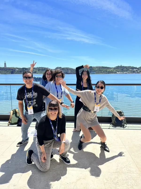 Wandr team on a waterfront terrace at a conference
