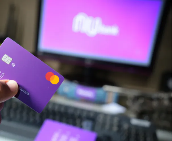 A person using a mobile banking app on a smartphone, illustrating intuitive UX design and seamless digital financial management.