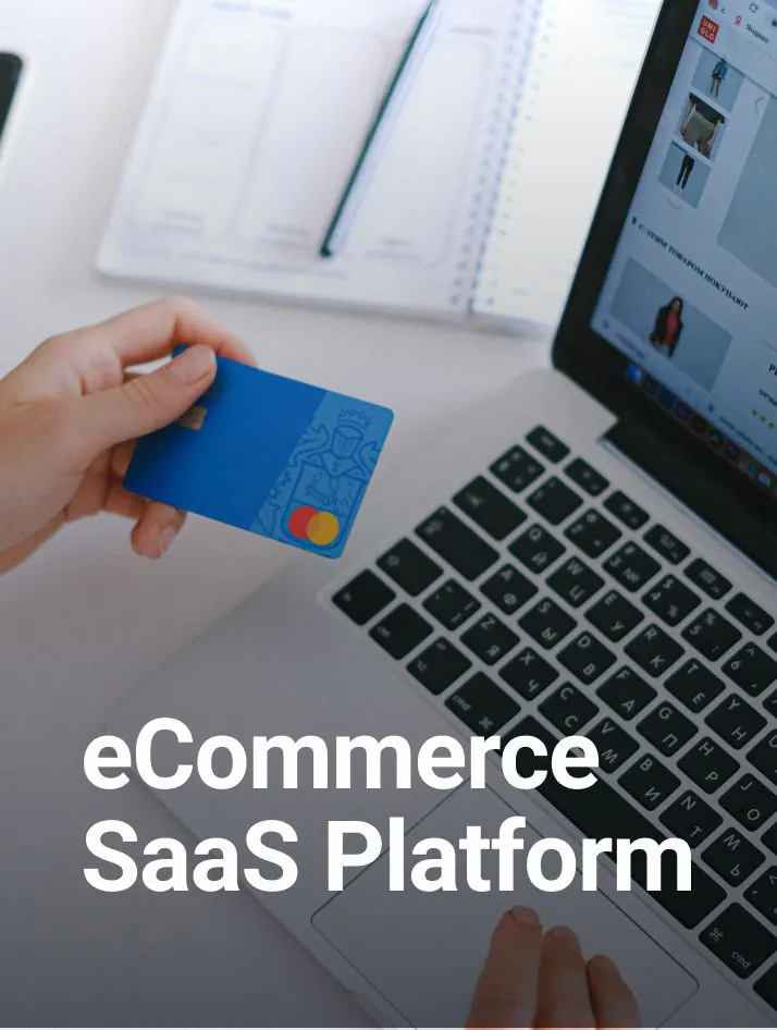 Business owner managing an online store using a SaaS eCommerce platform on a laptop with dashboard analytics visible on screen