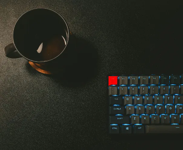 Marketing team using AI-powered tools for content creation, customer analysis, and automated email outreach on digital dashboards.