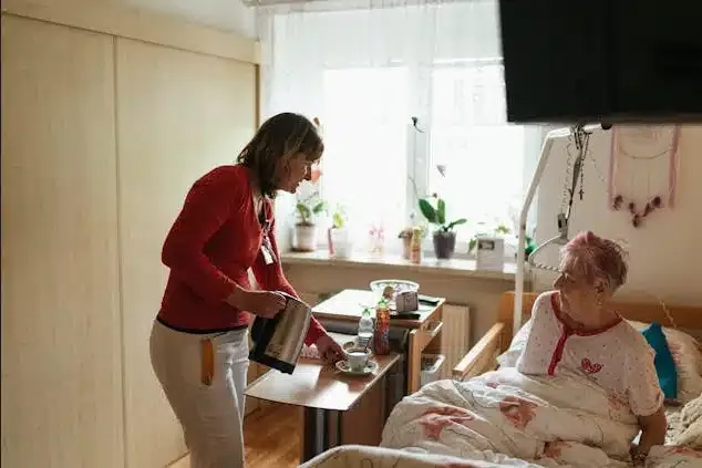 A post-surgery senior women receiving home care.