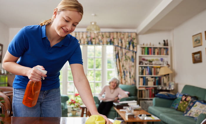 Caregiver providing homemaker services for an elderly women.