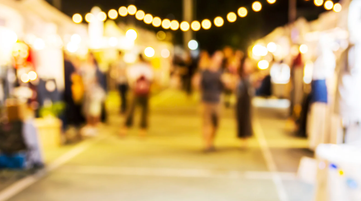 Summer night street festival in Atlantic Canada, road trip safety and travel tips for Maritime drivers.