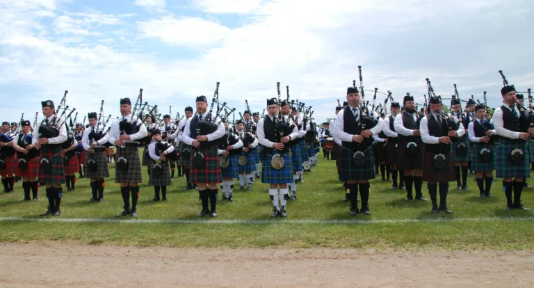 Scottish bagpipe band performing at Highland Games festival in Atlantic Canada