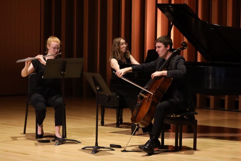 Classical chamber music performance with piano cello and flute in Atlantic Canada concert hall