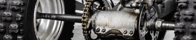 Close up of ATV drivetrain and mechanical parts showing importance of winter inspection and maintenance in the Maritimes