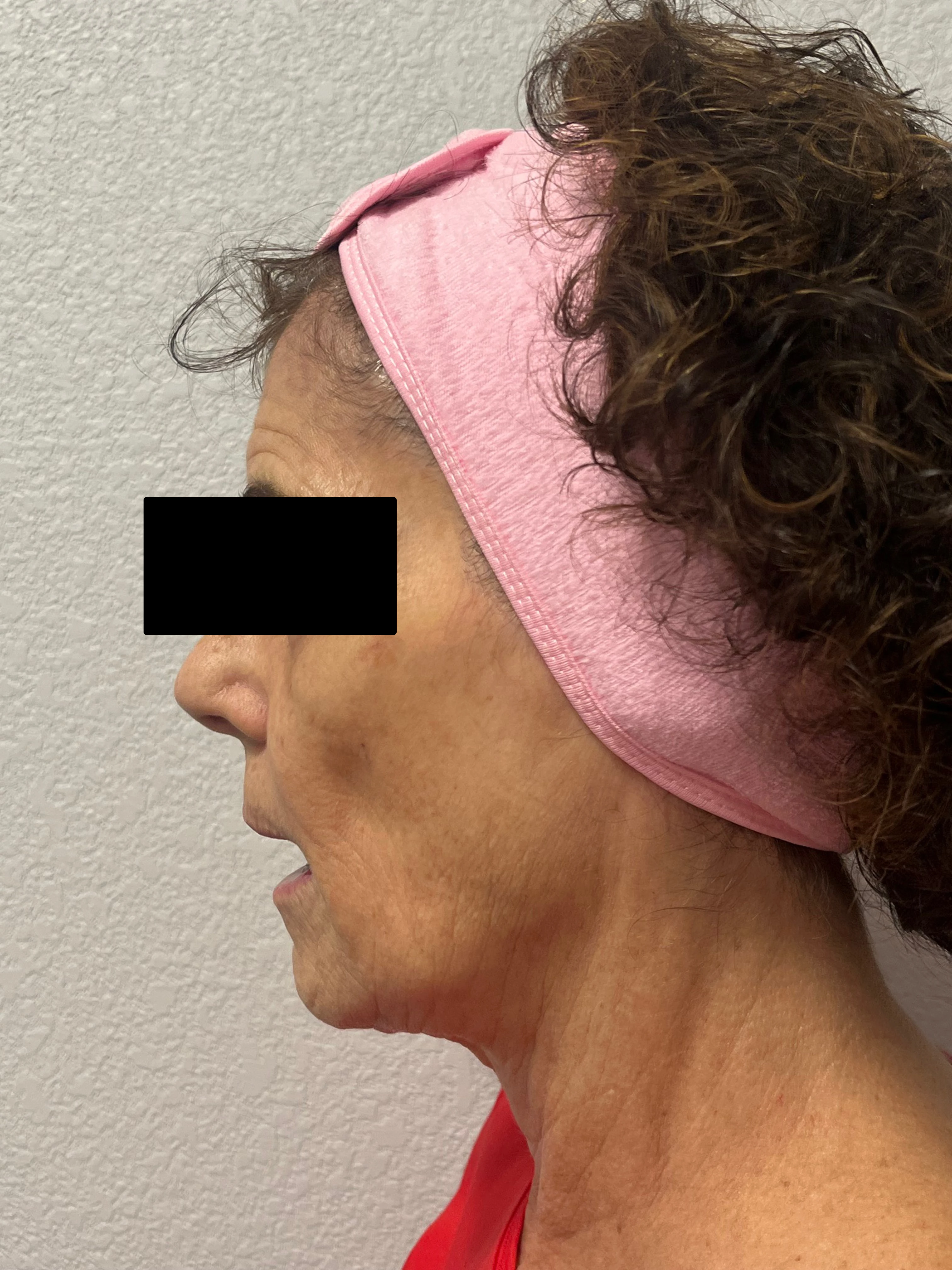 A woman with a pink headband on her head