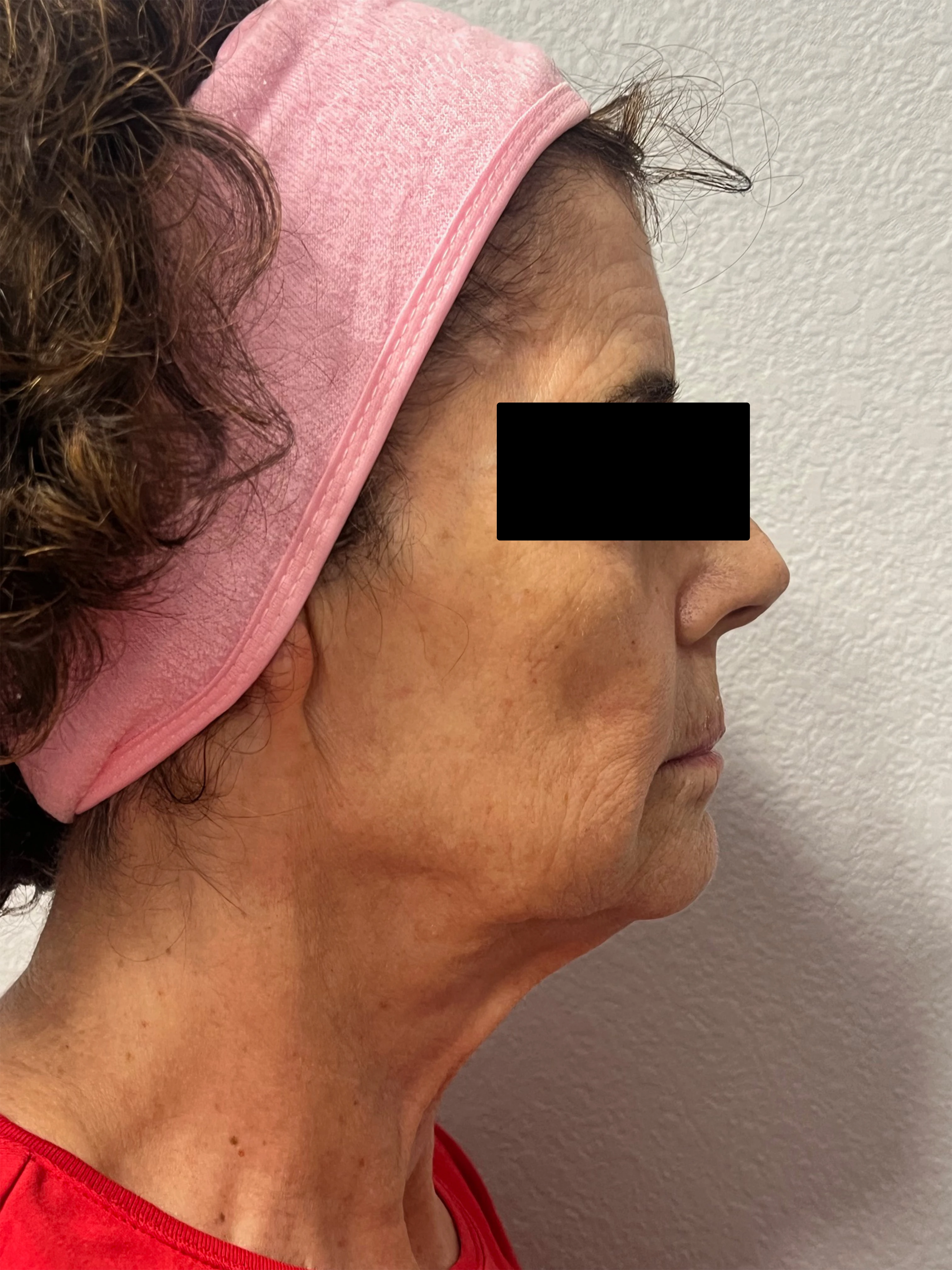 A woman with a pink headband on her head