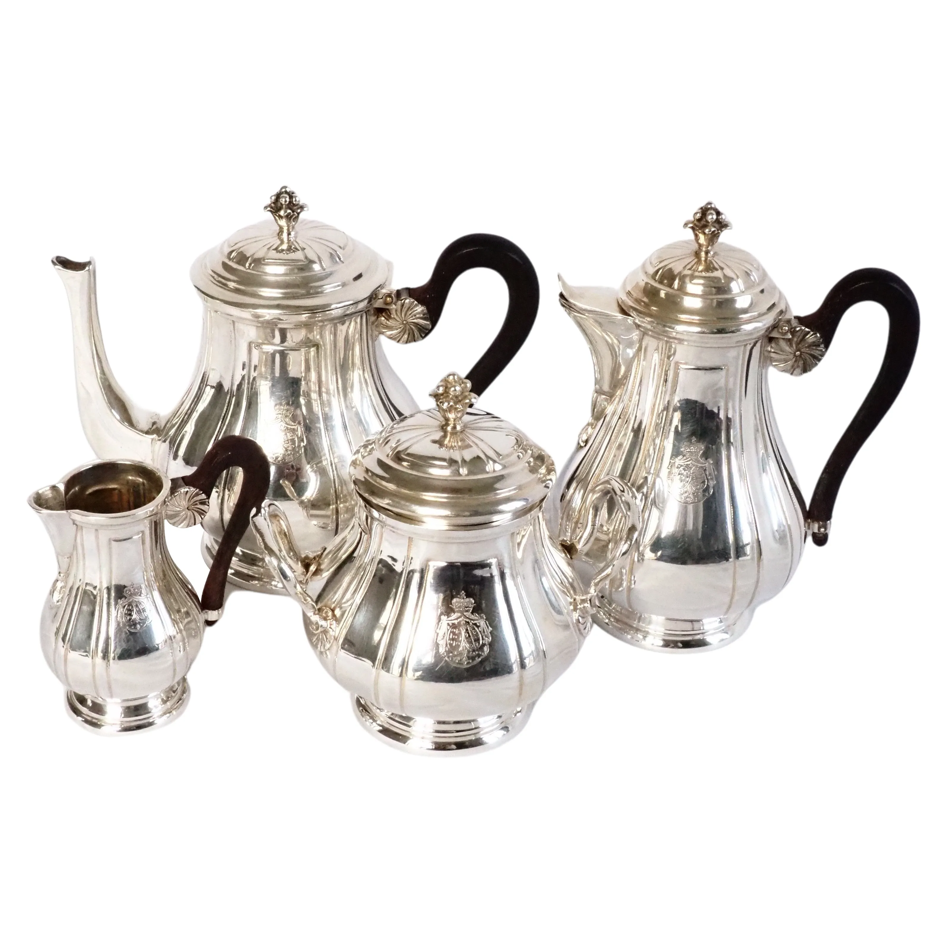 Service à thé et café en argent sterling gravé d'un blason, théière et pots en argent de collection