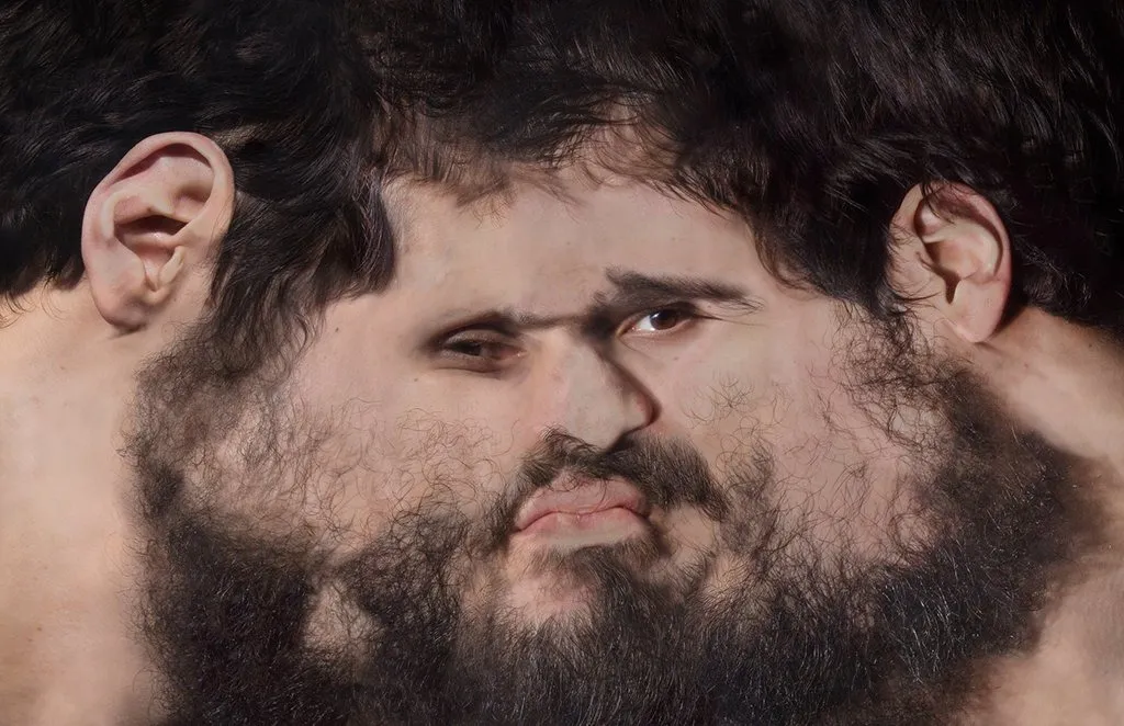 Computer generated image with two sides of the human face merged into one, distorted male face with beard, Petros Lales, The Time Traveler.