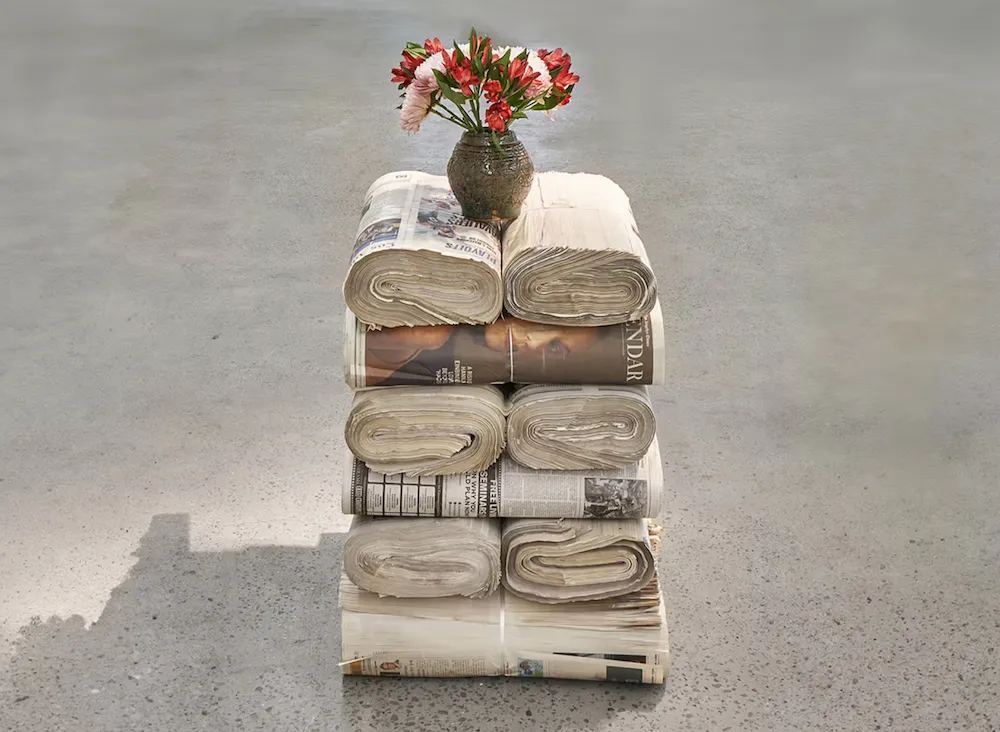 Abstract expressionist gestural paintings in EUROPA Gallery by Thomas McDonell with stack of newspaper sculpture and cut flowers in vase, Figueroa St paintings.