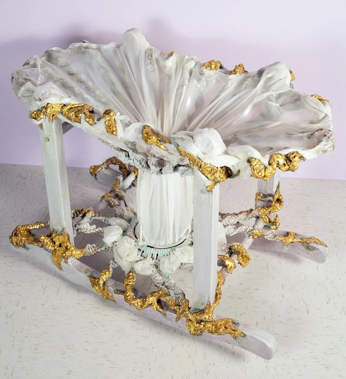 Pastel purple, white and gold sculpture using acrylic, silk, and resin by Lydia Nobles, titled Urvi. Art about reproductive rights, gender, sexuality, and abortion.