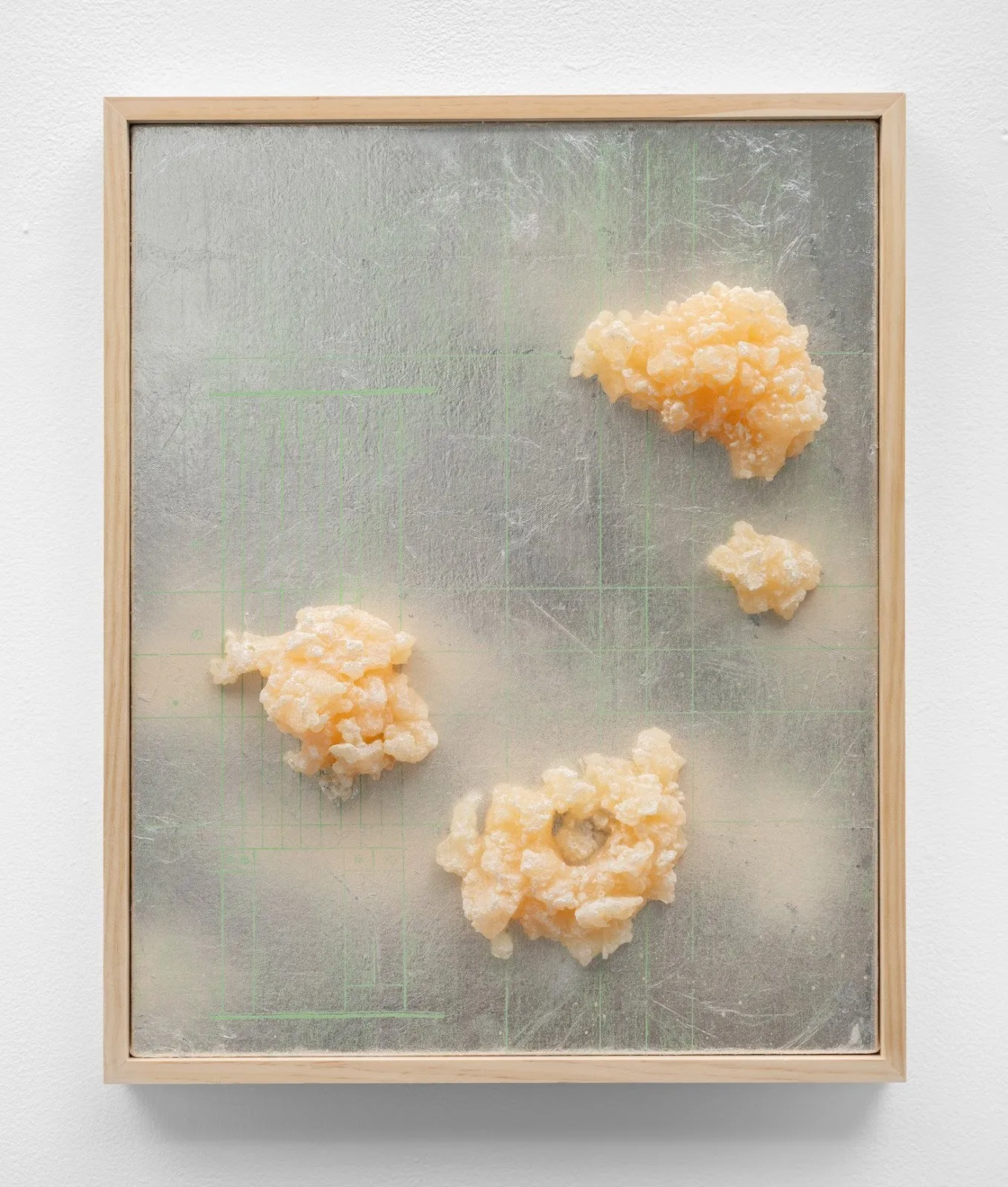 Naomi Nakazato, Toe the Line (Koseki ii), pale orange polyurethane crystalline structures against blackboard-like background with green grid lines in wooden frame, spirit duplicator at olympia gallery.
