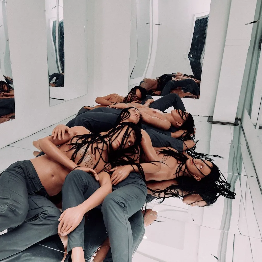 Mannequins of black topless bodies wearing jeans lying in a pile in mirrored infinity room, Miles Greenberg, Respawn Body, mixed media art gallery group exhibition, new york now, 25 allen street.