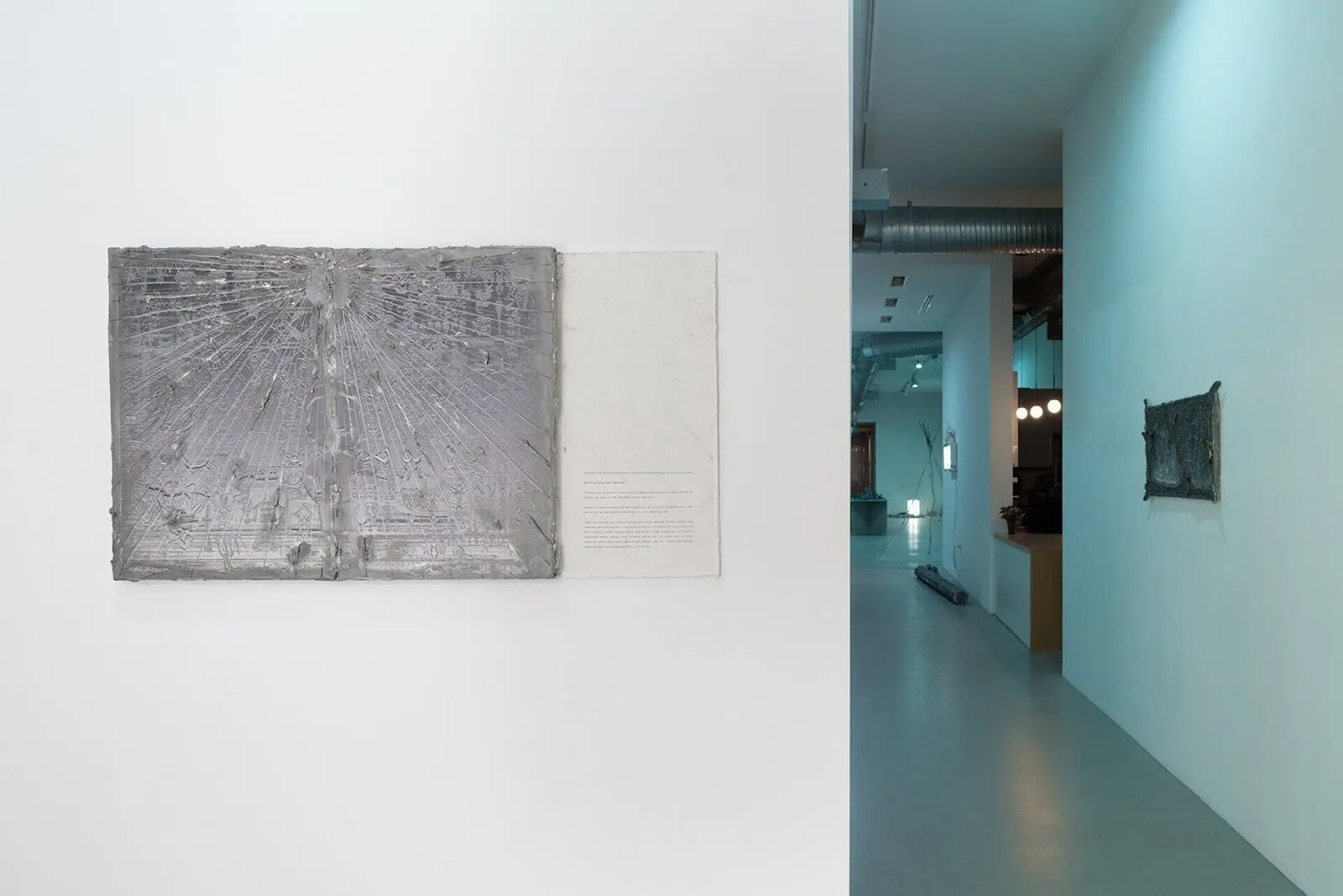 Gallery exhibition of sculptures and installations covered in blue light, Misha Ilin, pale grass blue at hamiltonian artists, reviewed by Nina Oleynik.