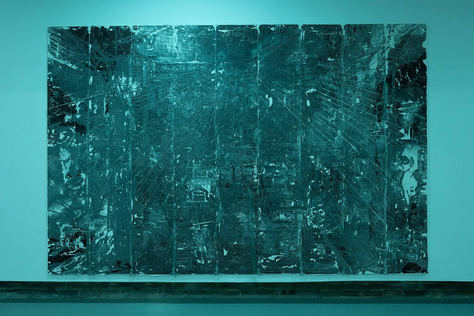 Gallery exhibition of sculptures and installations covered in blue light, Misha Ilin, pale grass blue at hamiltonian artists, large scale textured painting, joint compound spray paint drywall, titled the room.