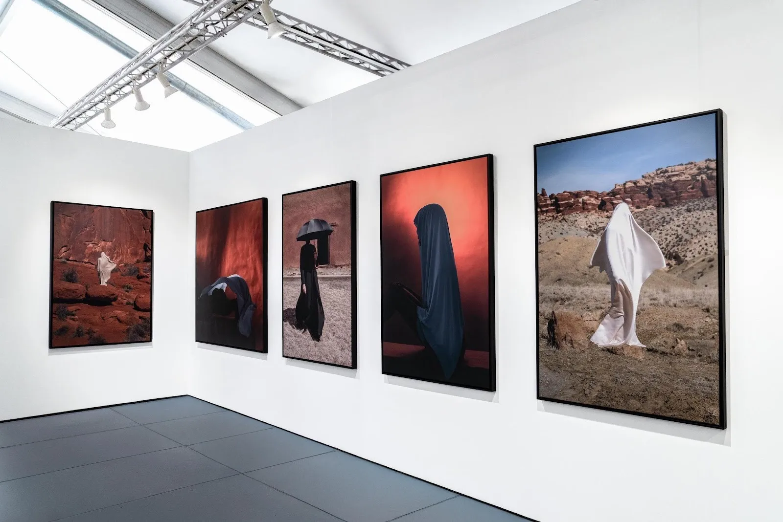 Installation view of Juan Sebastian’s photographic work at SCOPE, 2024, Colombian immigrant artist Miami art fair shows, retrospective 10 years.