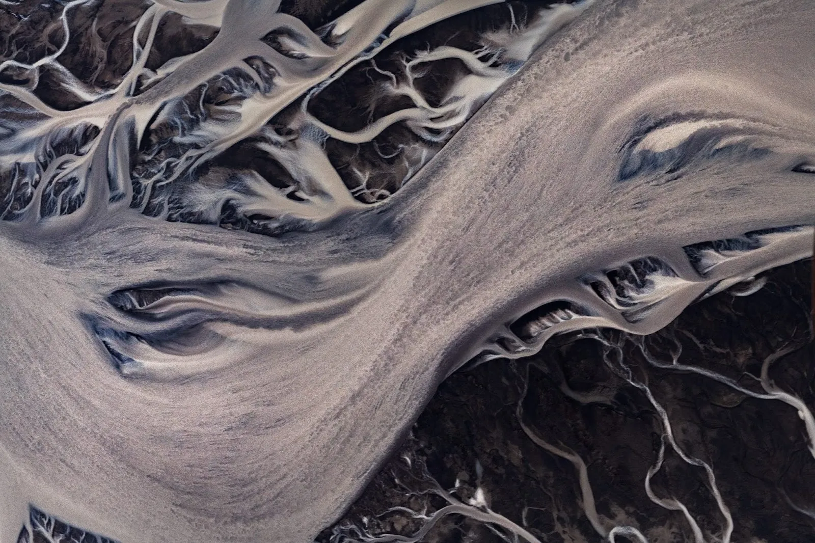Arctic flow, arctic glaciers in abstract configuration photographed from aerial view, nature and wildlife photographer Mital Patel.