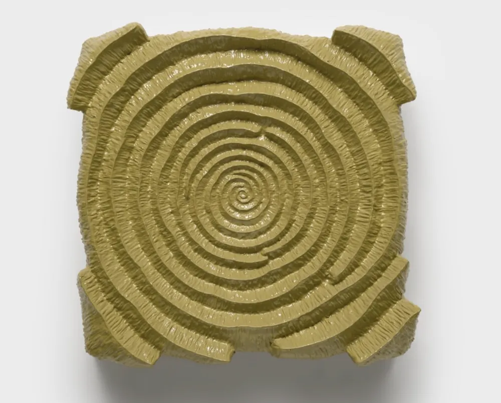 Yellow ochre sculpture of dizzying concentric circle ripples, goodbye a door opens, Linda Stark, ethereal material solo exhibition at ortuzar projects, new york, review by corinne worthington.