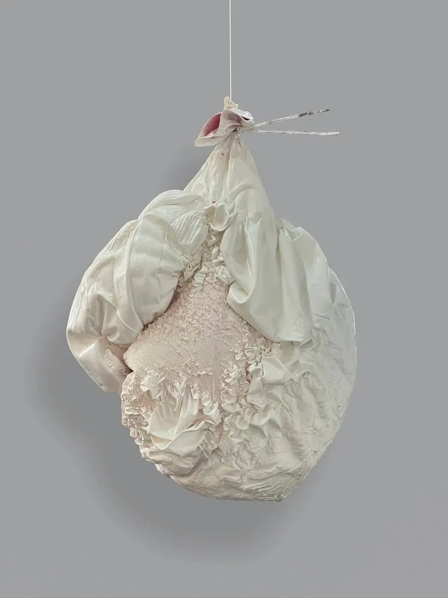 Sculpture artist Lesley Bodzy, wip 2024, deflated balloon injected with foam in cast resin, symbolic of aging and Beauty standards, interview with journalist xuezhu jenny wang.