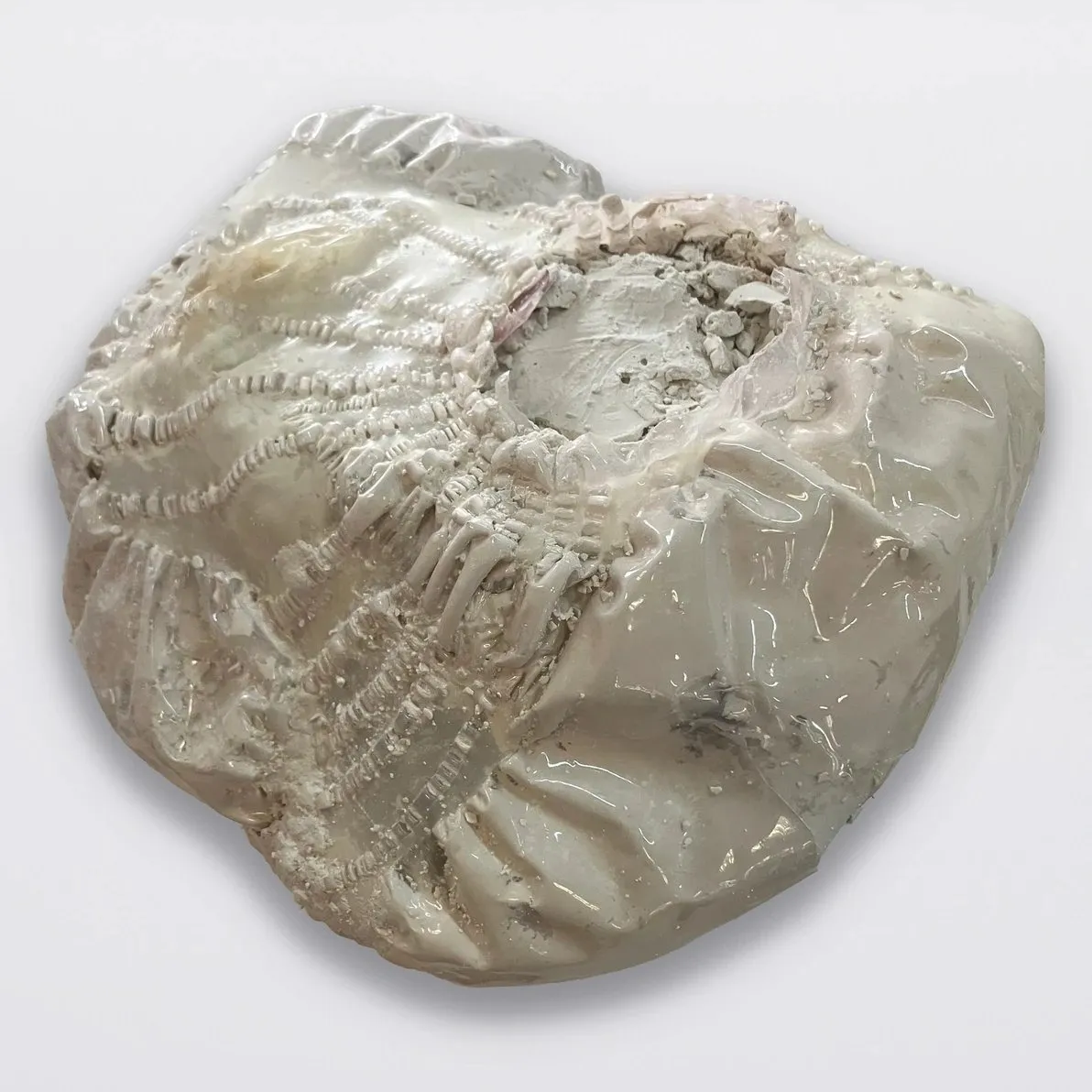 Sculpture artist Lesley Bodzy WIP 2024, pale off white plaster and deflated balloon, symbolic of aging and beauty standards, interview with journalist xuezhu jenny wang.