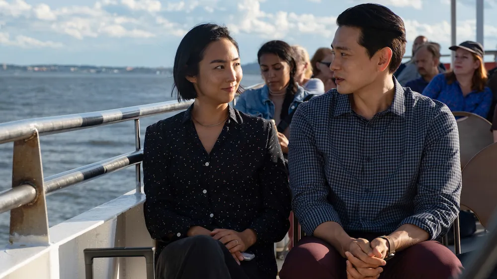 Celine Song, Past Lives, film review by Tiffany Babb, Greta Lee and Teo Yoo in the movie Past Lives (Jon Pack / Sundance Institute).