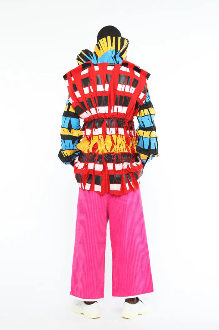 Refashioning: CFGNY, Wataru Tominaga, Eliza Blackorby fashion exhibition review Hammer Museum, Japan Society, Asian diaspora designer, red pleated outfit