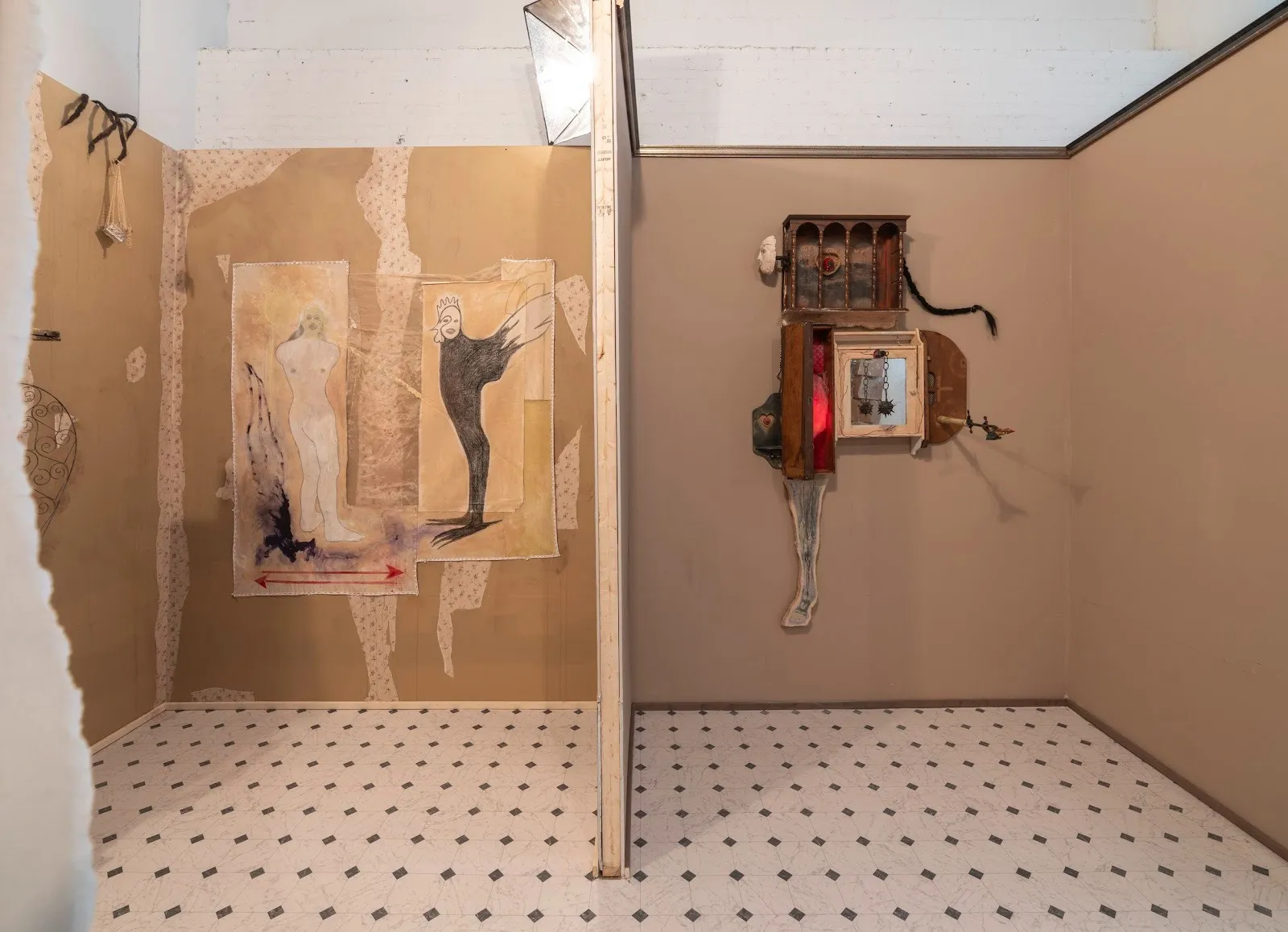 Faux walls, rustic furniture, and zoological motif sculptures at Amy Bravo: TransmogrificationNow! at Swivel Gallery.