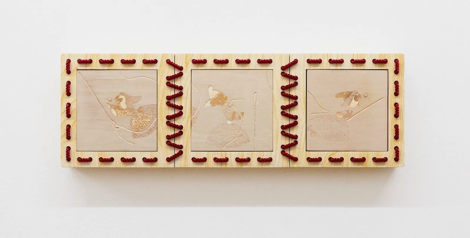 Huidi xiang, there's nothing to it really, three wooden blocks Engravings connected by red resin threads, reference to Disney Cinderella 1950, solo exhibition, goes around in circles til very very dizzy, YveYANG Gallery.