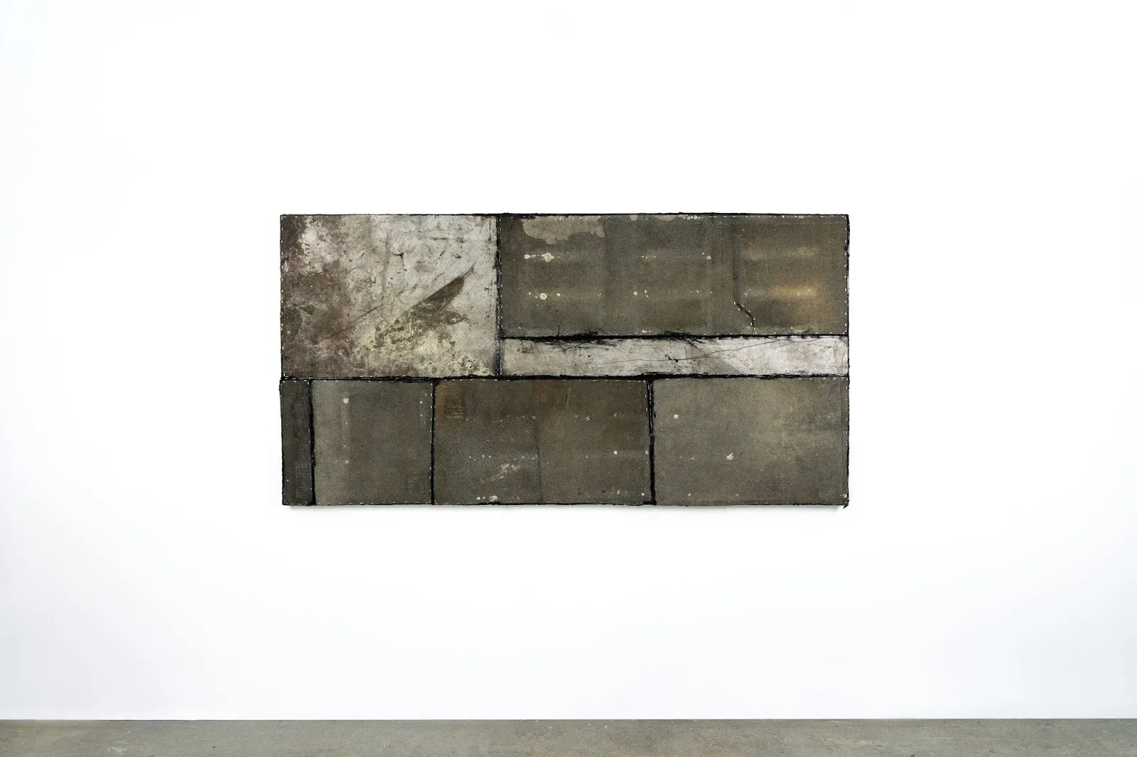 Dark Patchwork collage titled flag with stitches, Builders material, enamel, bitumen, and silicon, levi de jong sculptural collage, impulse magazine interview.