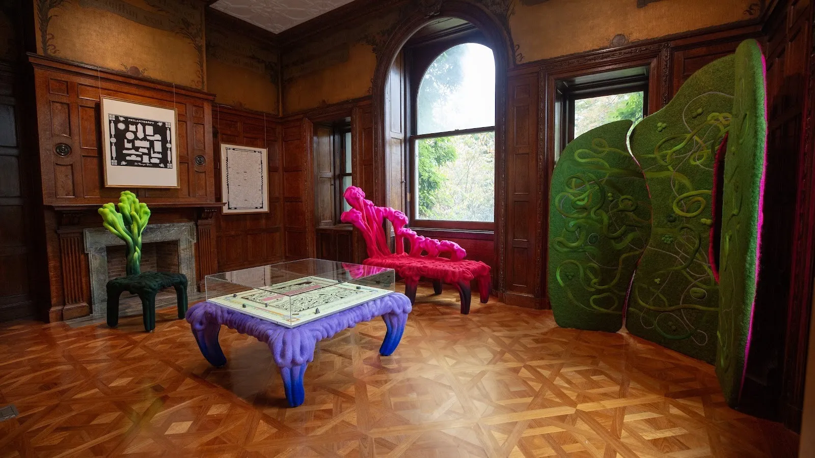 Inside of Andrew Carnegie's home office at cooper hewitt design museum, transformed into game room by liam lee and tommy mishima for making home, smithsonian design triennial with needle felted wool furniture to highlight institutional corruption.