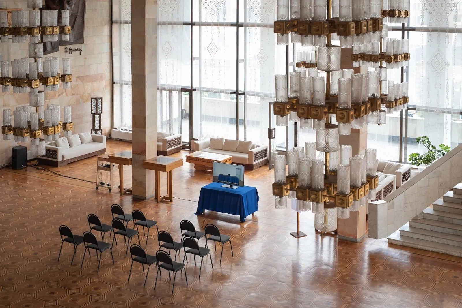Installation by bojan stojcic in a hotel lobby, peace hotel phantom at the ivano frankivsk national theatre.