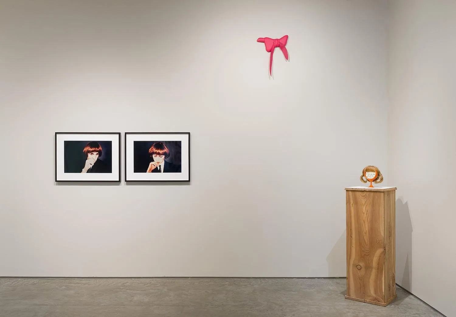 Gallery space with hair-related sculptures, installations, and 2D artworks on the wall, care condition control curated by AE Chapman at 601artspace.