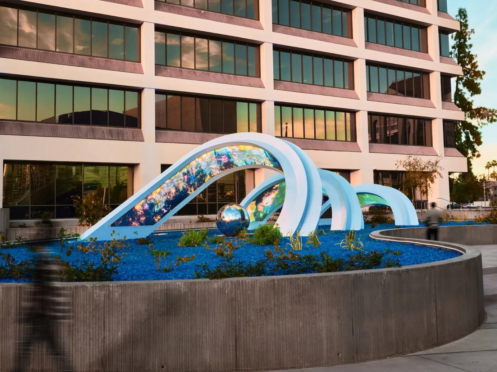 Adrian Yu and omer yosef Strata, 2024 public art installation in front of mesa city hall featuring spiral archways and LED panels with climate data visualization.