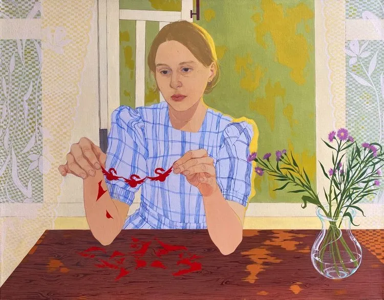 Ester Petukhova, Changing of the Seasons, painting of young girl in checkers blue and white dress holding up red paper cuts next to evasive flowers in front of lace curtains.