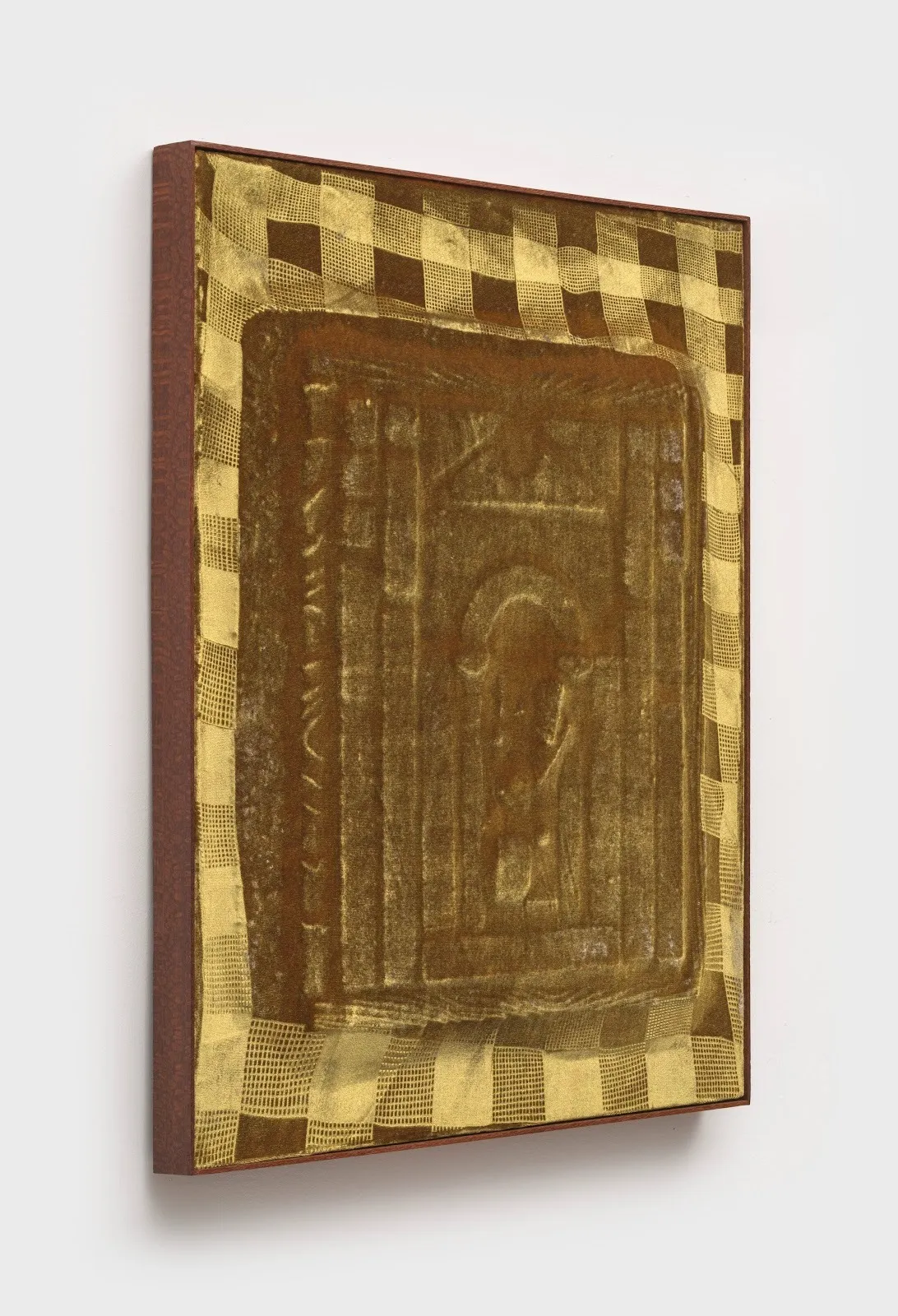 Side view of a light brown painting-like work. The surface is velvet, revealing a gingham-like background. The foreground relief outlines a rectangular, decorated structure.