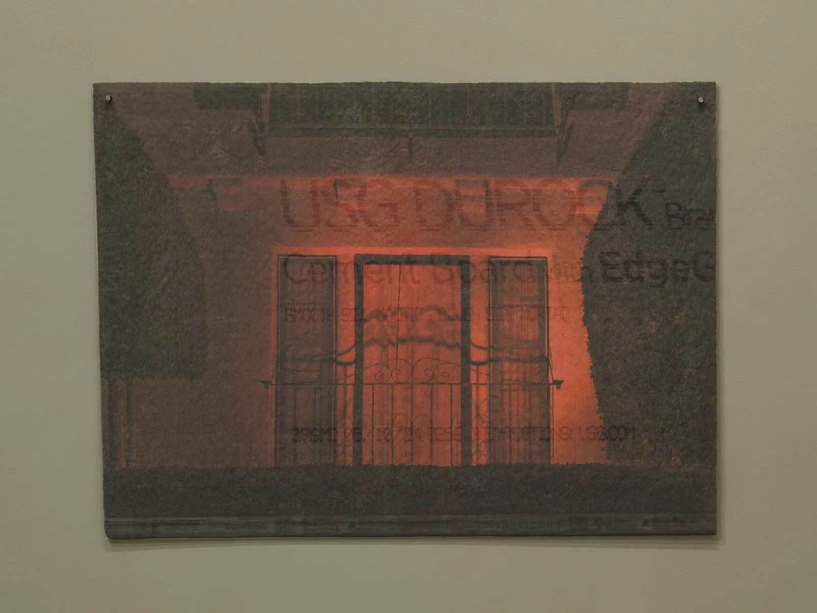 A painting nailed to the wall which depicts a dimly red-lit apartment balcony.