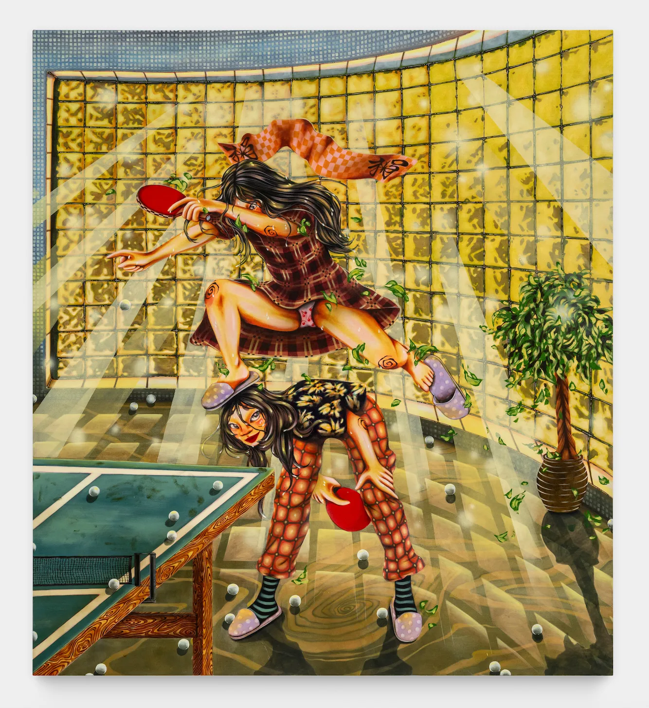 In a glass-tiled room with rays of light streaming in, two women participate in a table tennis game. One woman leaps over the other, mid-swing, her face obscured by her arm, while the other crouches below. They are surrounded by table tennis balls.