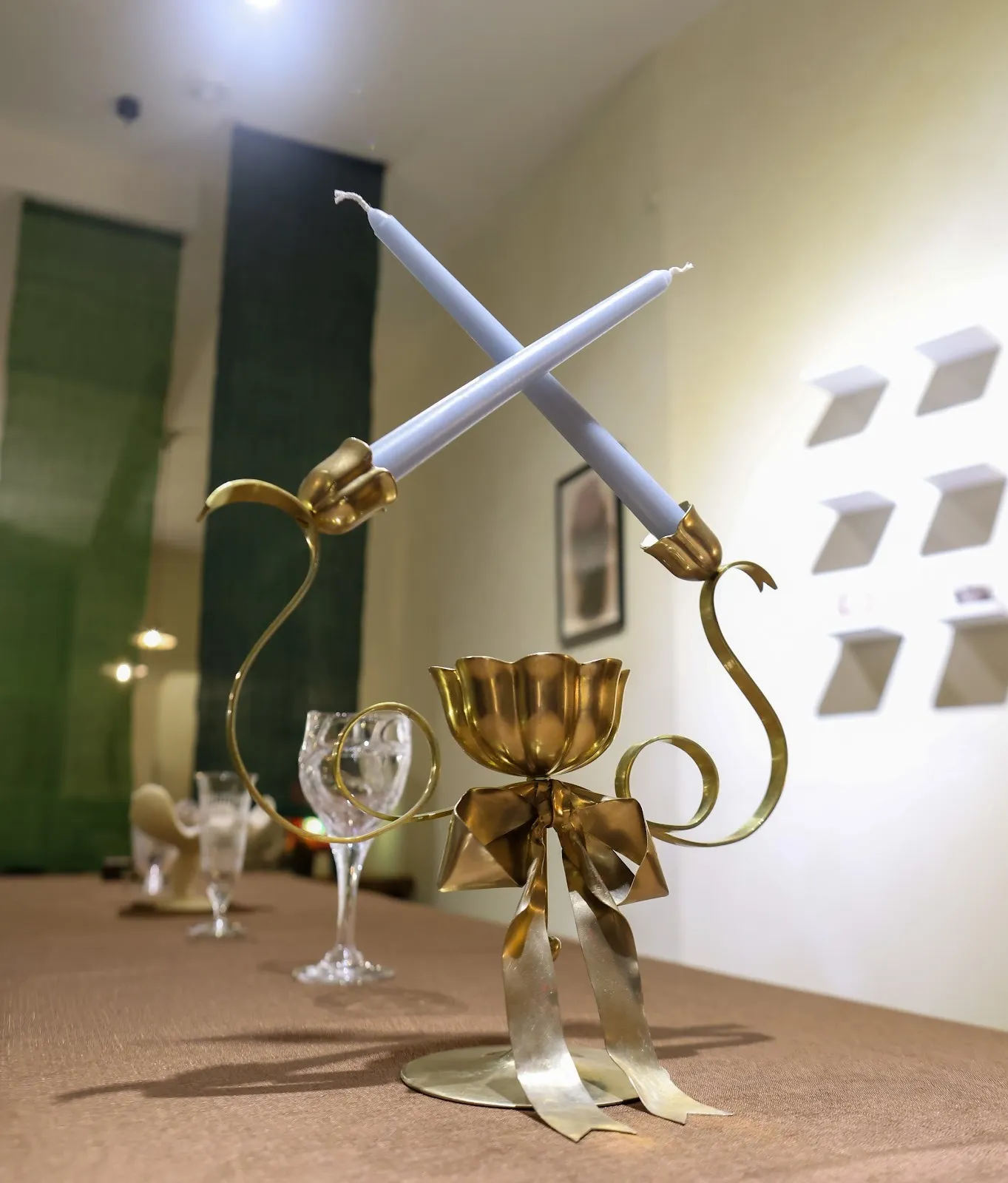 Installation view of Cin Cin! A Toast to Living. Foreground: Belle Zhao, Love to Miss You Candelabra (2025). Courtesy of the artist and Flowing Space.