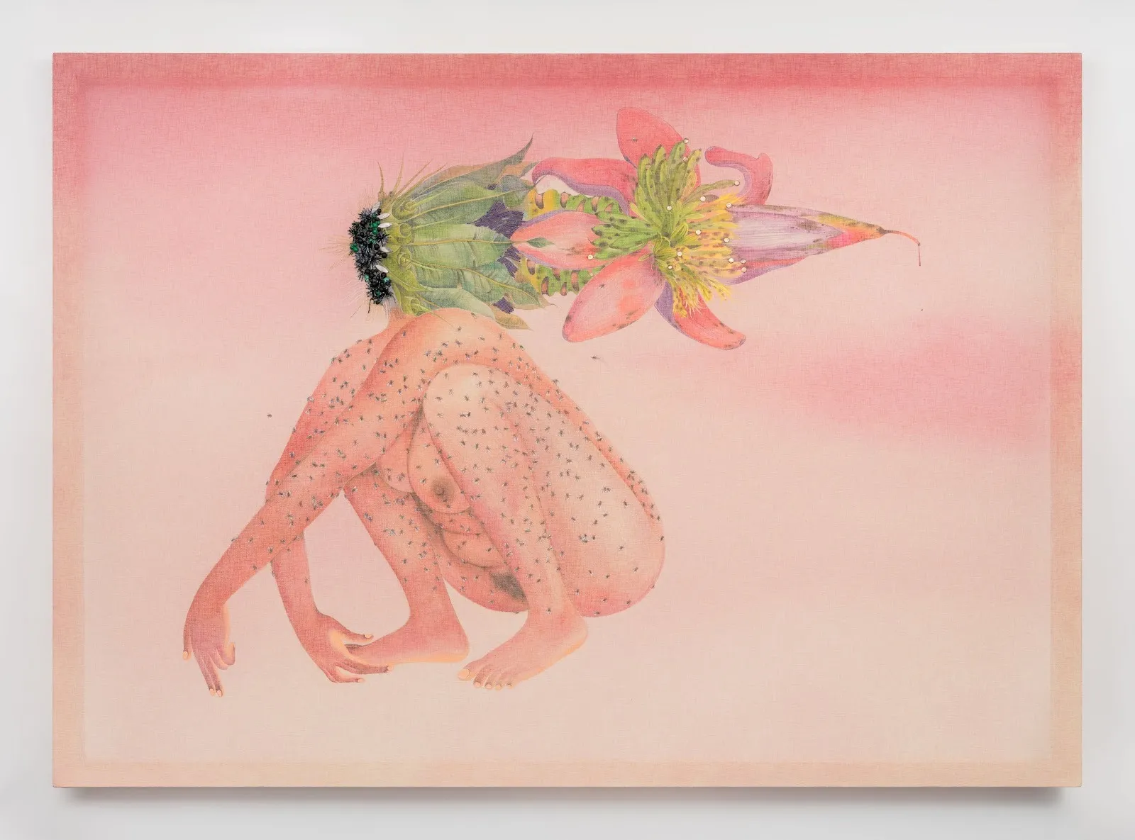 Against a painting's background washed in light pink, a female figure couches. Their body is dotted with flies, and their head is replaced by a large, intricate flower-like structure, flowing out and away from their turned face.