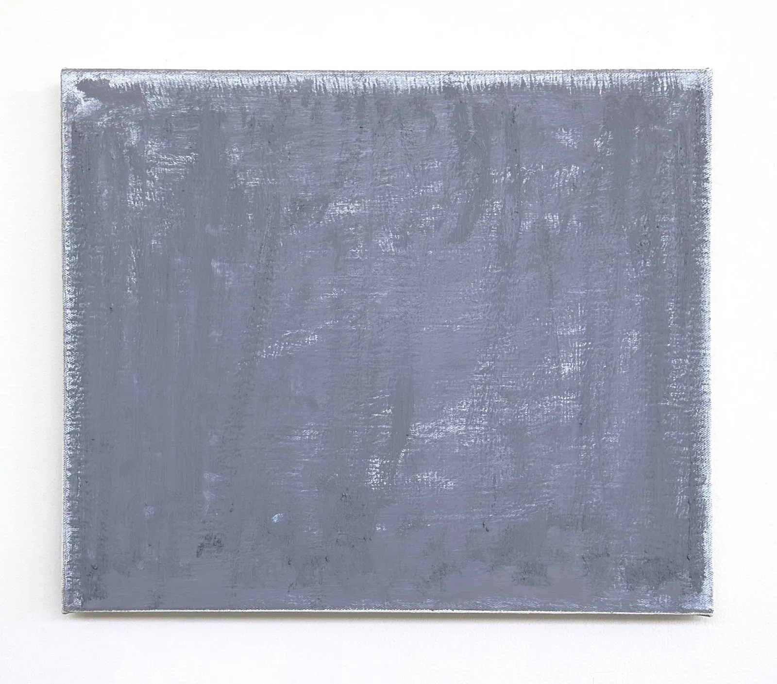 A painting depicts rough, dry brushstrokes of steely, blue gray against a white background.
