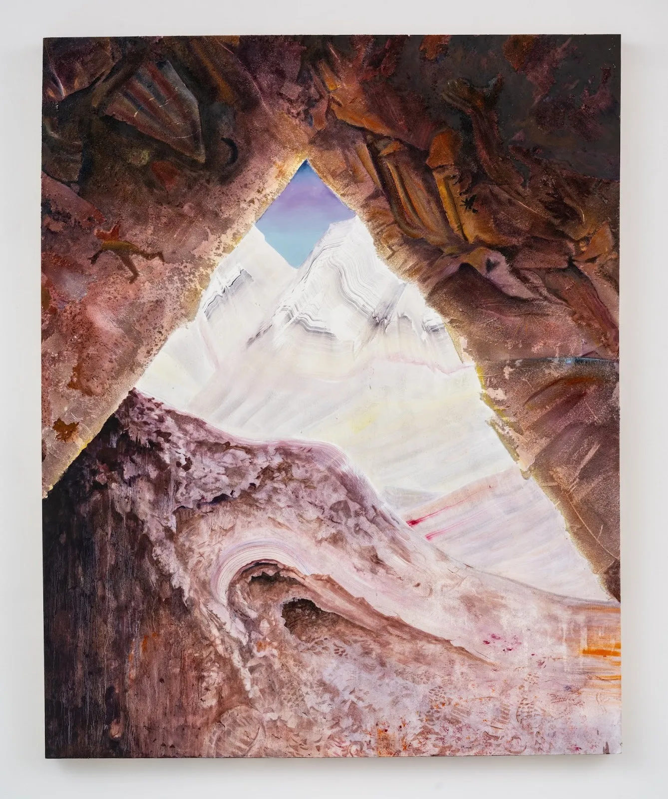 Painting of a snowy peak seen through a cave opening in dark red rock.