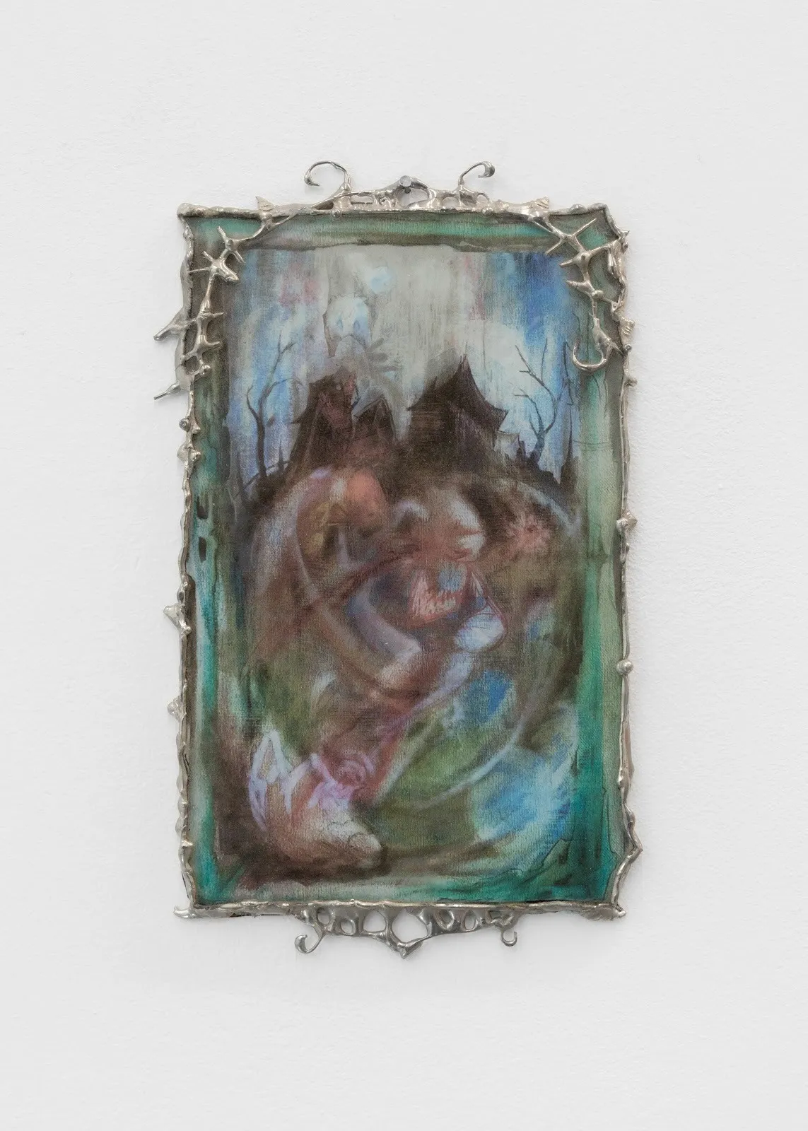 A vertical rectangular wall-mounted work features an ornate silver frame with protruding, spiky lines which houses a semi-abstract landscape with an undecipherable, wispy foreground. The image is phantasmagoric and ghostly.