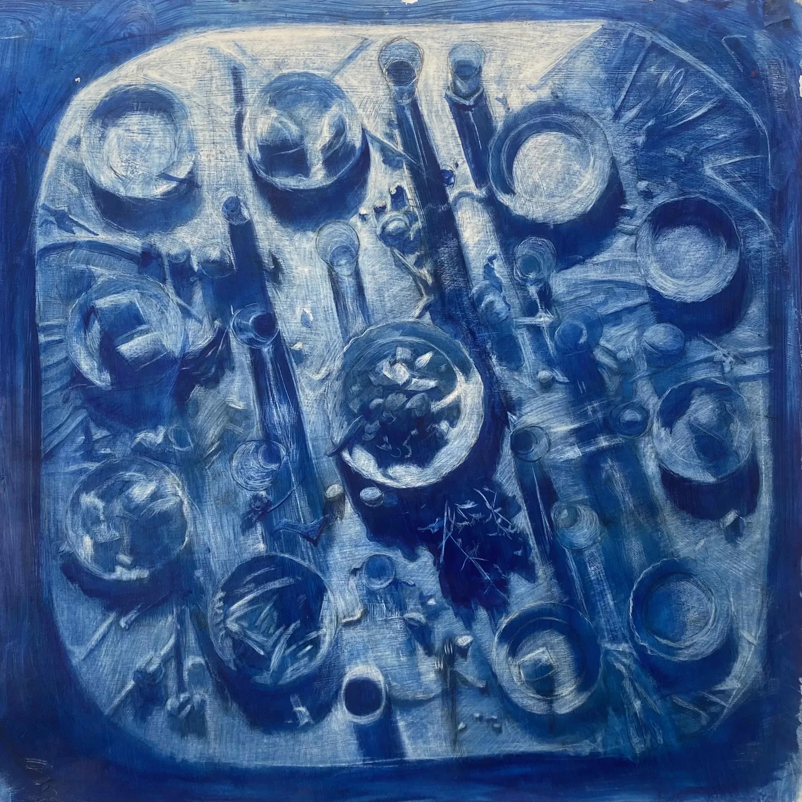 A monochromatic blue painting depicting an overhead view of scattered mechanic's wrenches and tools arranged across a surface, rendered in deep cobalt and pale blue tones with expressive, textured brushwork.