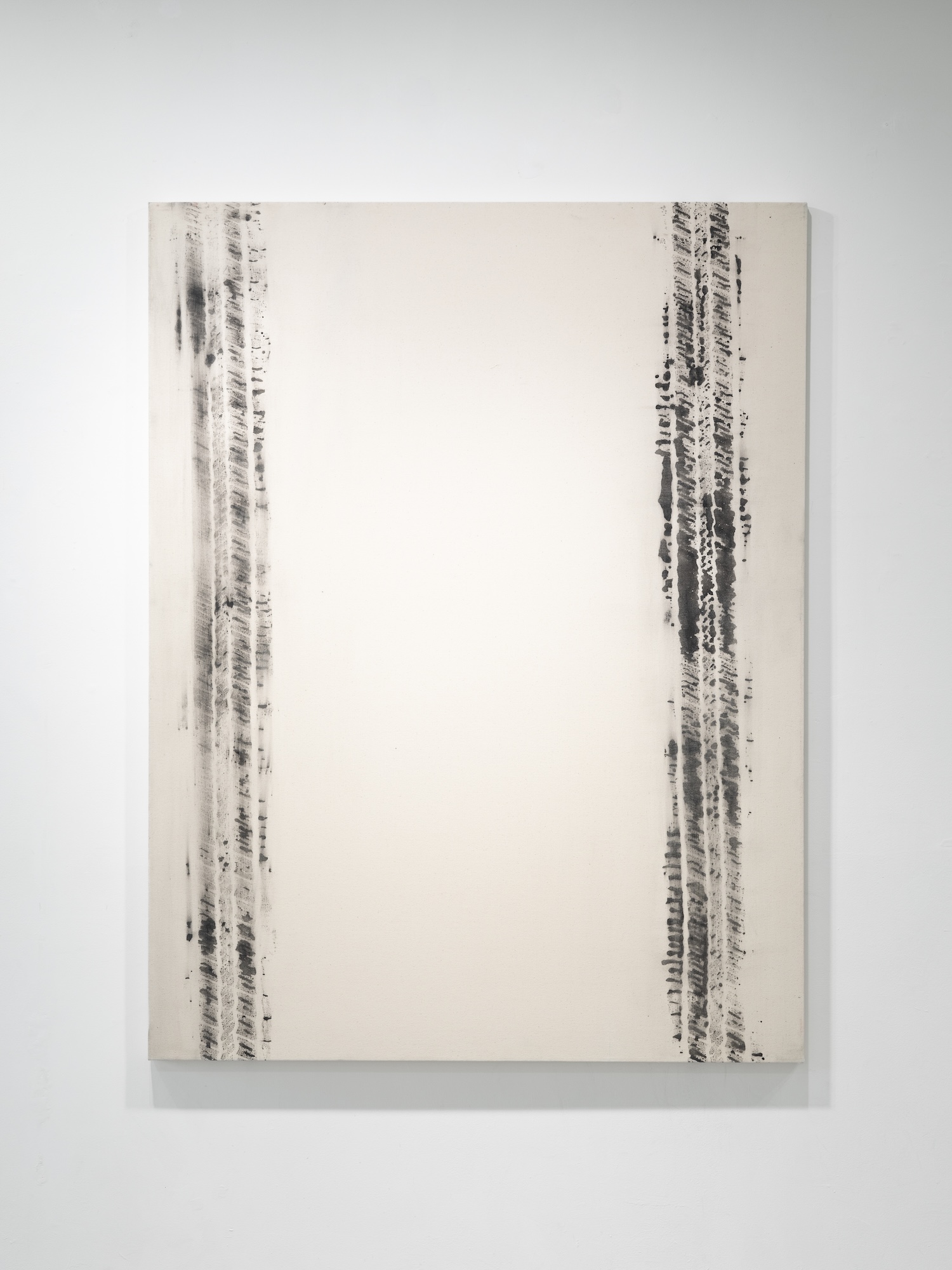 Abstract painting on cream canvas with two vertical bands of dark, streaked marks running down the left and right edges, framing a wide blank central field.