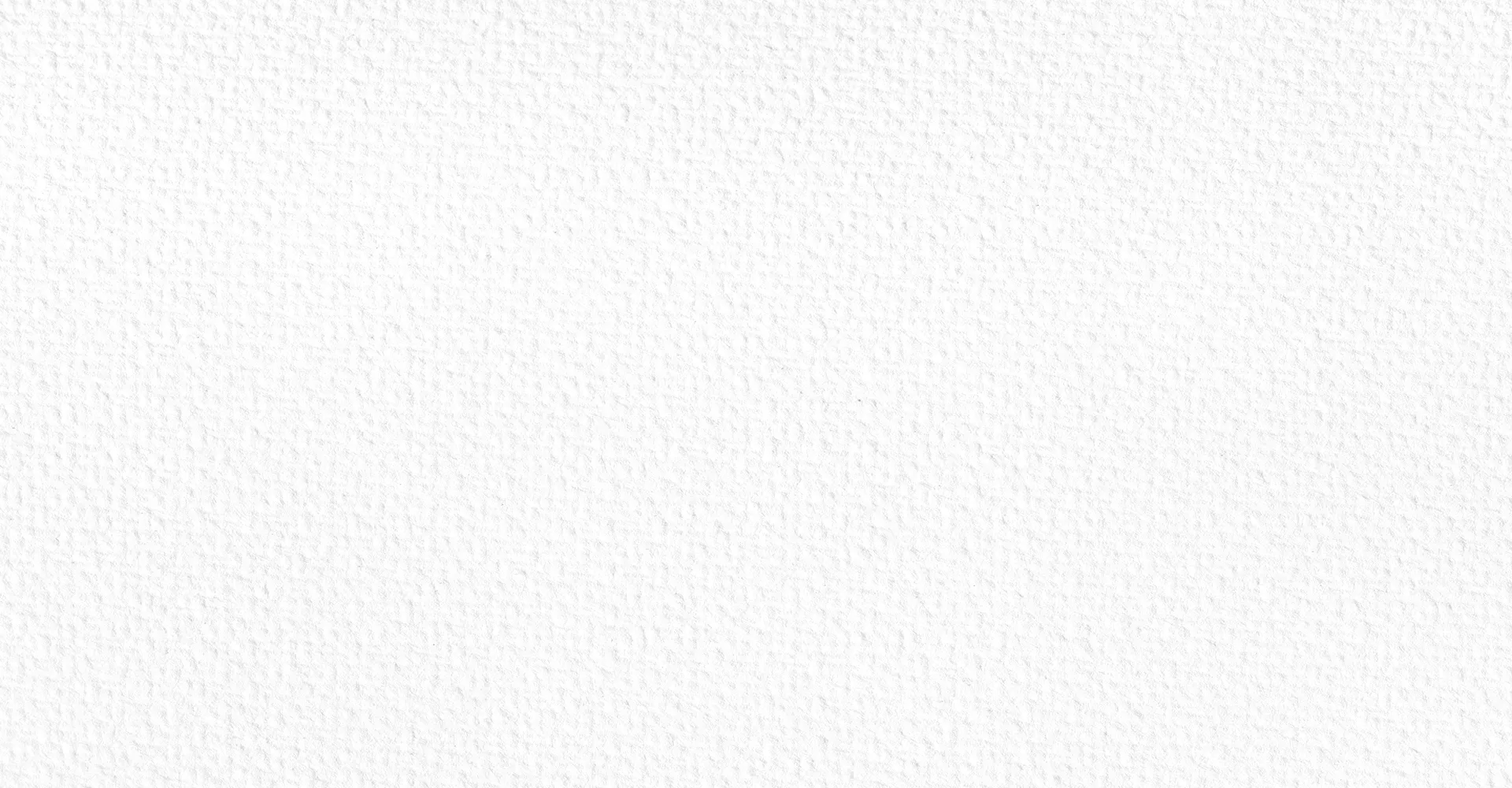 Close-up texture of rough white stucco wall.