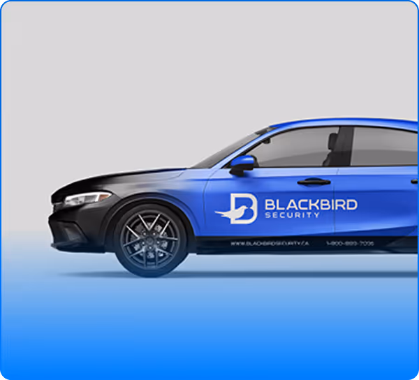Blue and black Blackbird Security company car showing logo and contact information on the side.