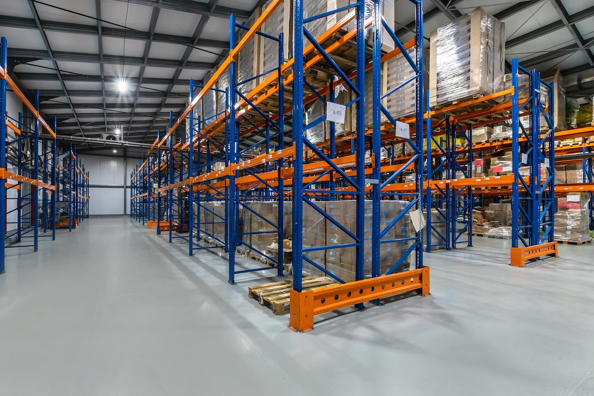 Warehouse interior with industrial storage systems and pallet racks